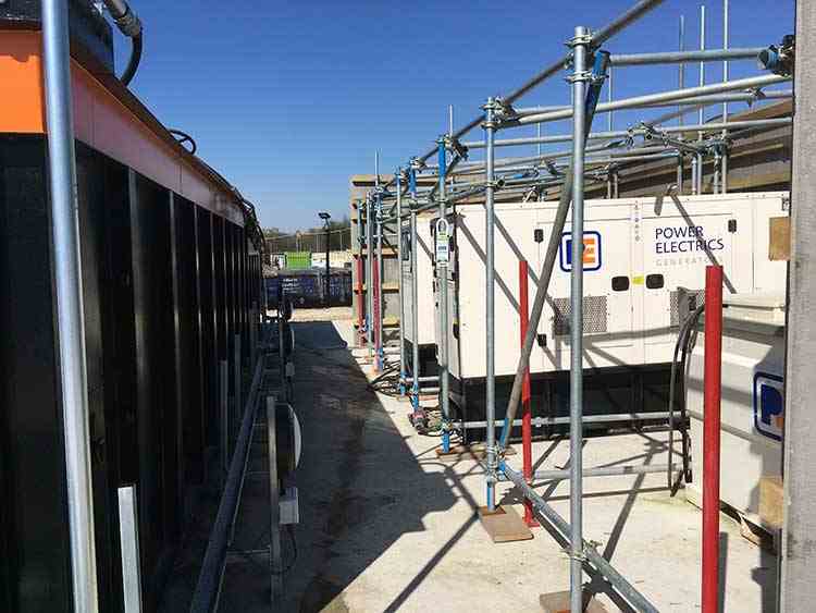 Generators on hire at a train refueling station