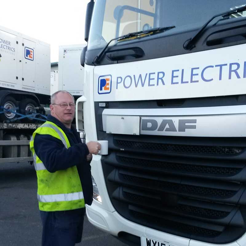 Dave the driver in front of a lorry