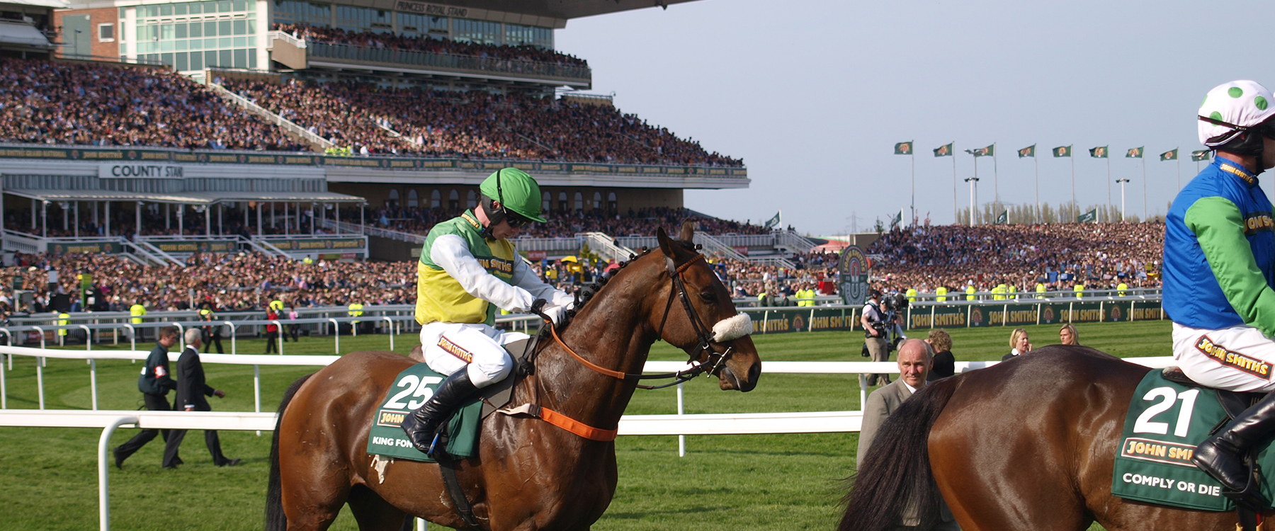 Man on horse at races )